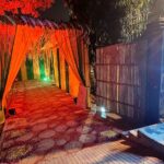 Garden view dining setup during sunset at Garden of 7 Senses